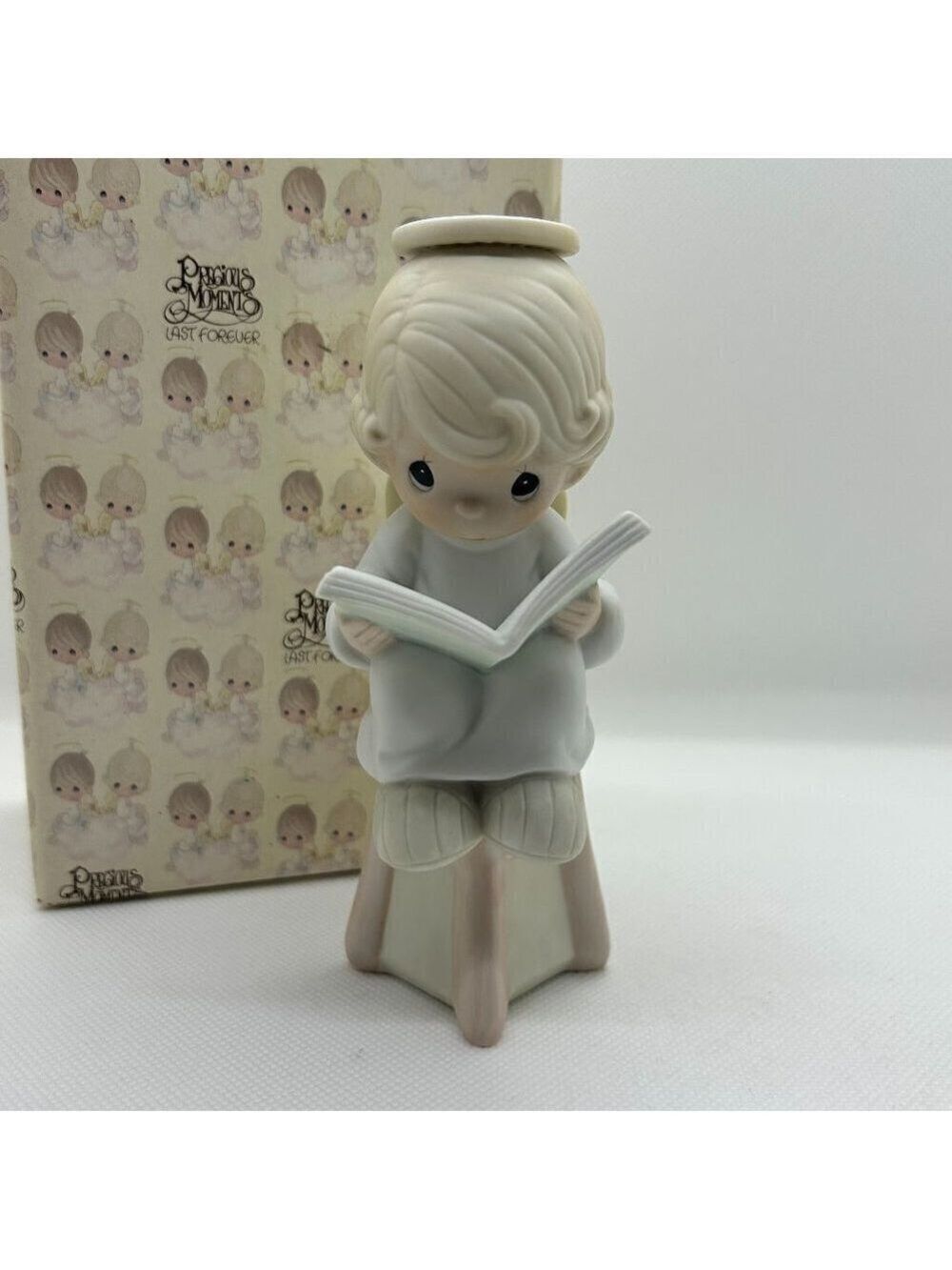 Precious Moments "Sitting Pretty" figurine